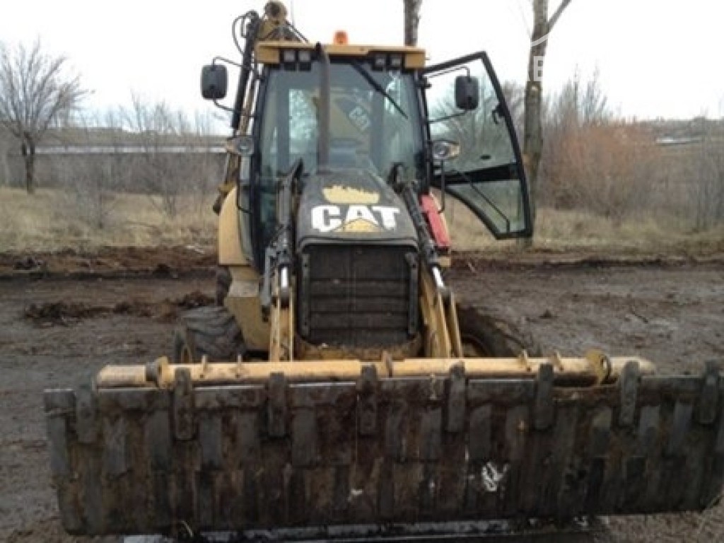 Экскаватор Caterpillar 428E