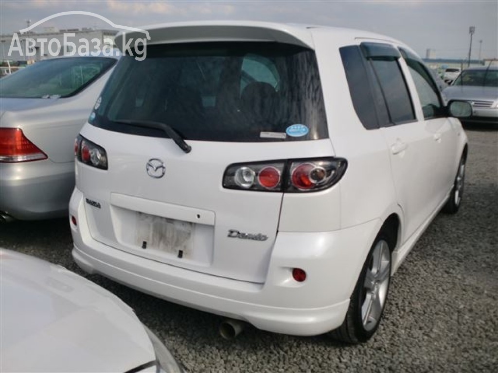 Mazda Demio 2005 года за ~500 000 руб.