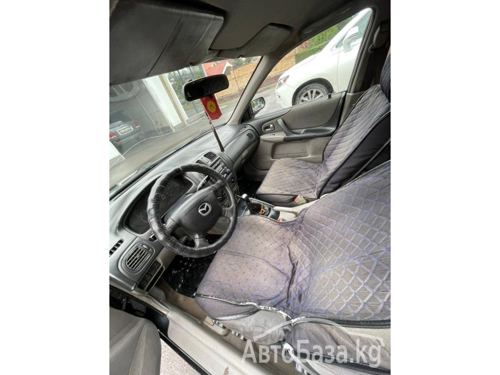 Mazda 323 2002 года за ~211 300 сом