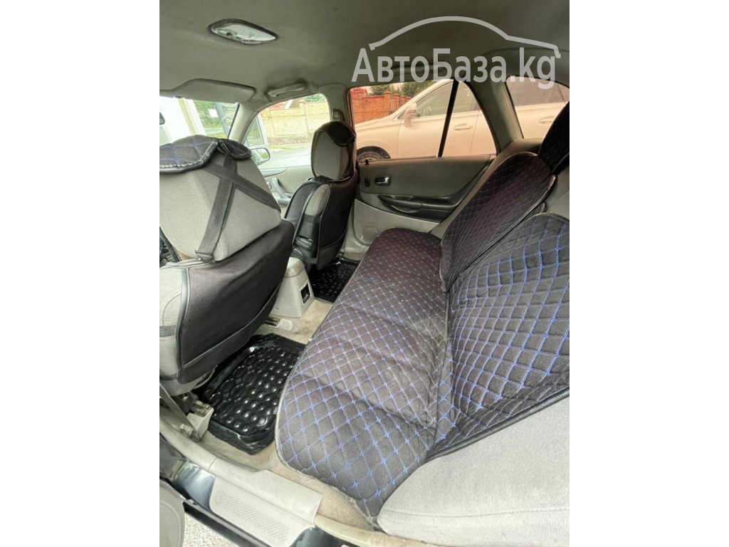 Mazda 323 2002 года за ~211 300 сом