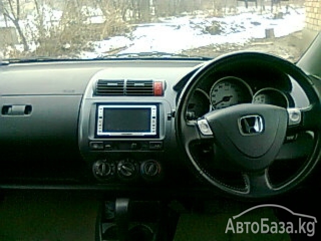 Honda Fit 2003 года за ~381 900 руб.