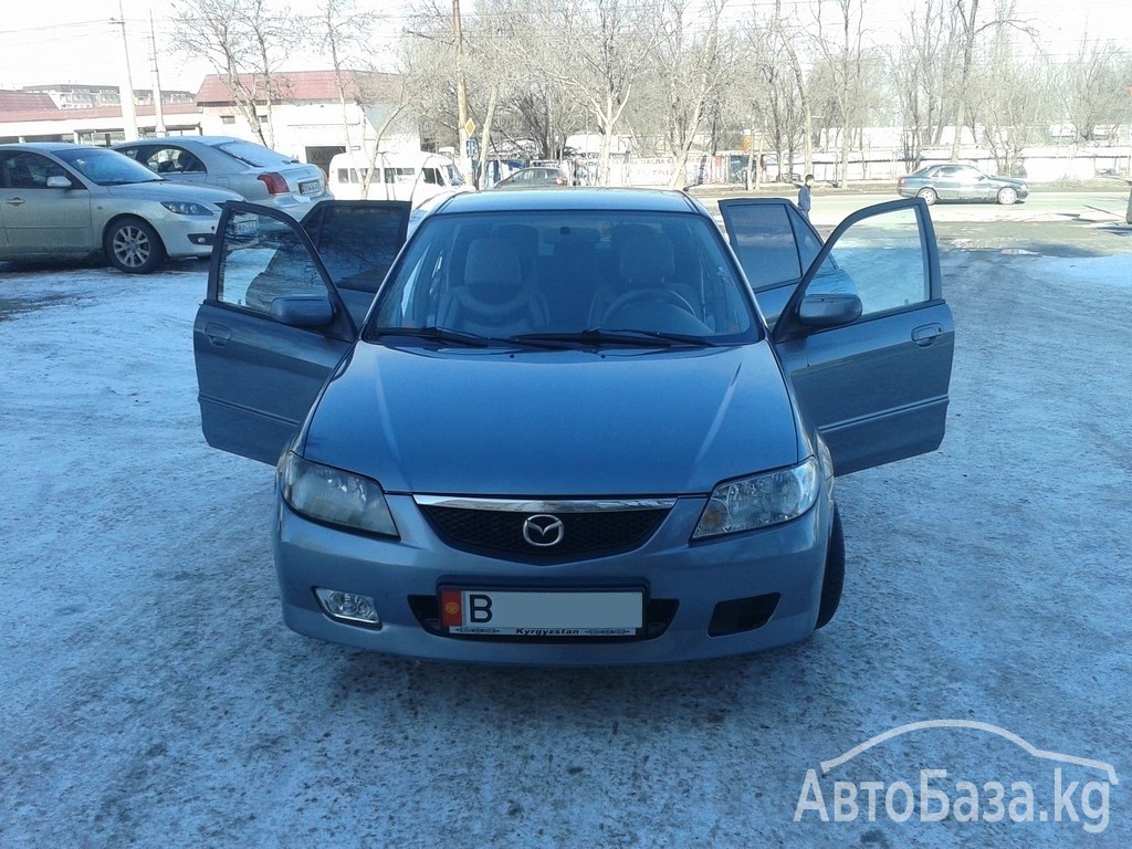 Mazda 323 2002 года за ~260 600 сом