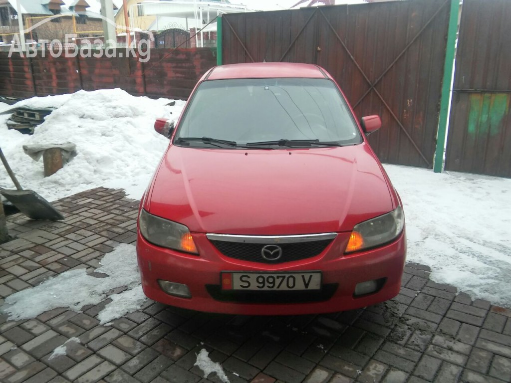 Mazda 323 2001 года за ~265 500 сом