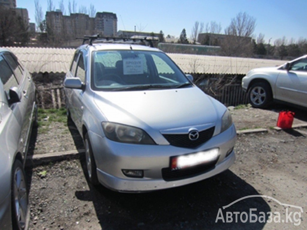 Mazda Demio 2003 года за ~318 200 руб.