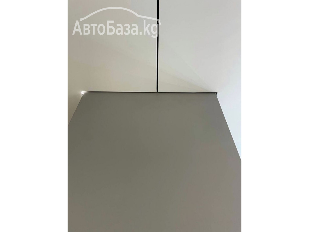 Установить натяжной потолок.