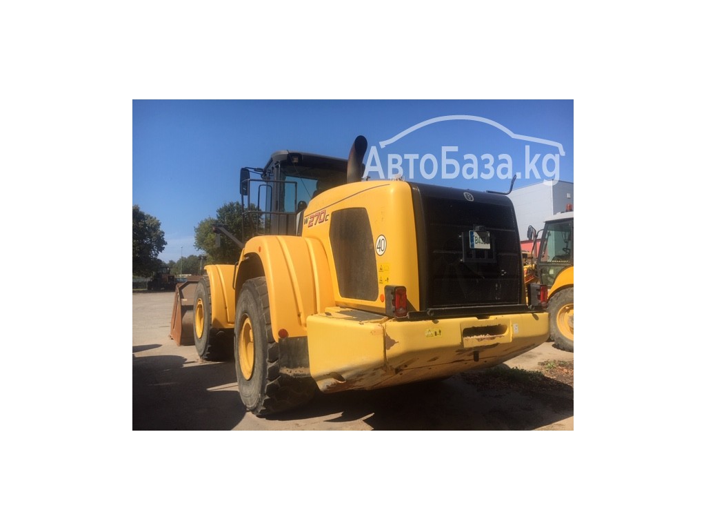 Погрузчик New Holland W270C