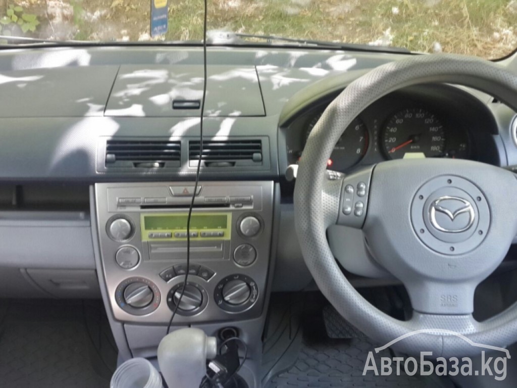 Mazda Demio 2003 года за ~267 300 сом