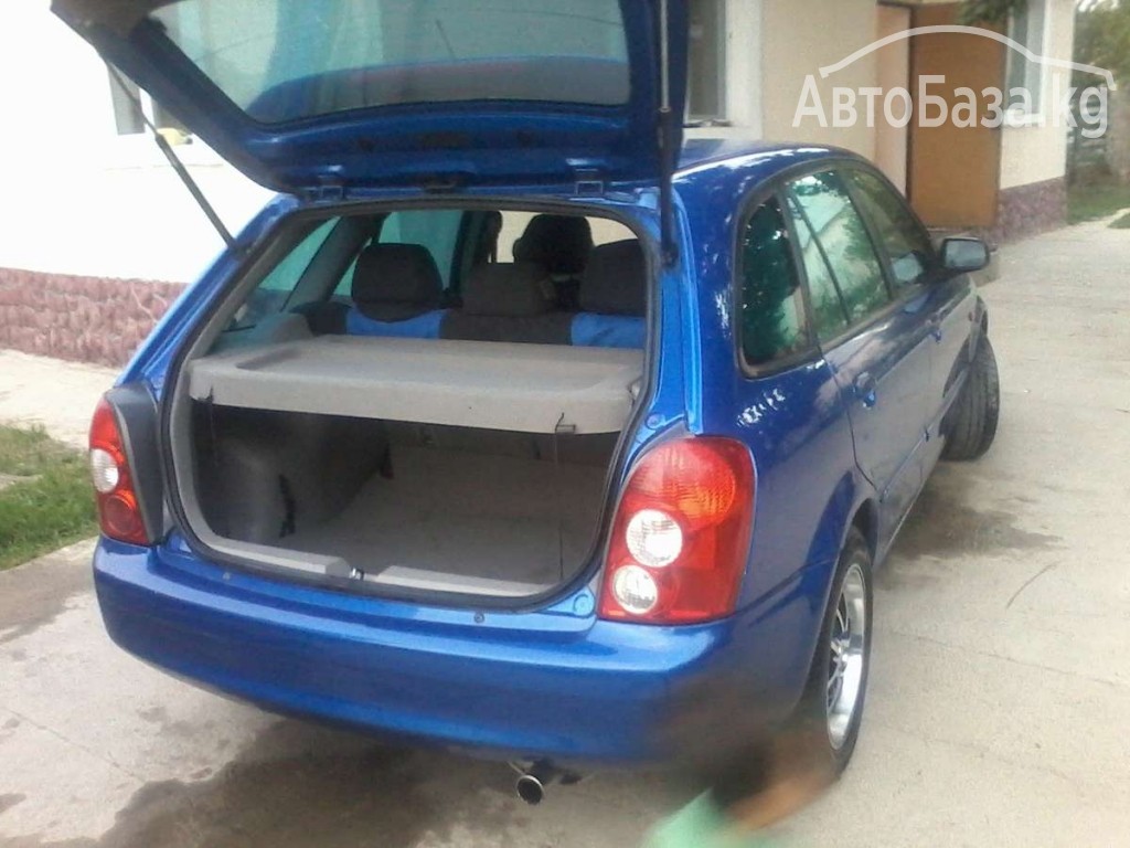 Mazda 323 2003 года за ~336 300 сом