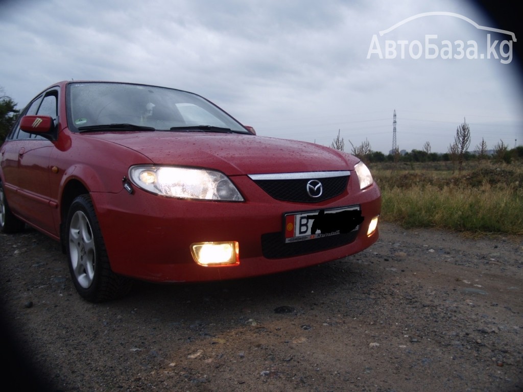 Mazda 323 2001 года за ~299 200 сом