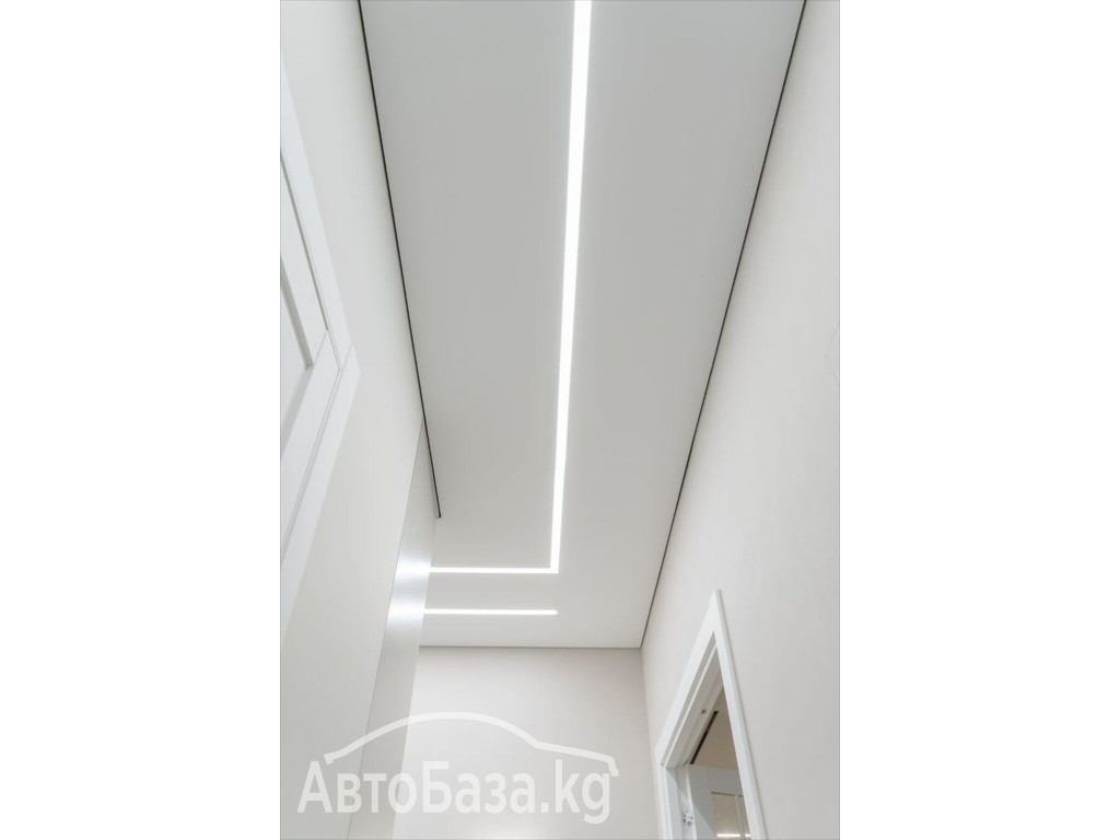 Установить натяжной потолок.