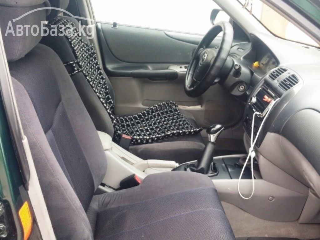 Mazda Familia 2002 года за ~391 400 сом