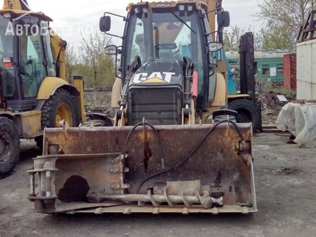 Экскаватор Caterpillar 428E