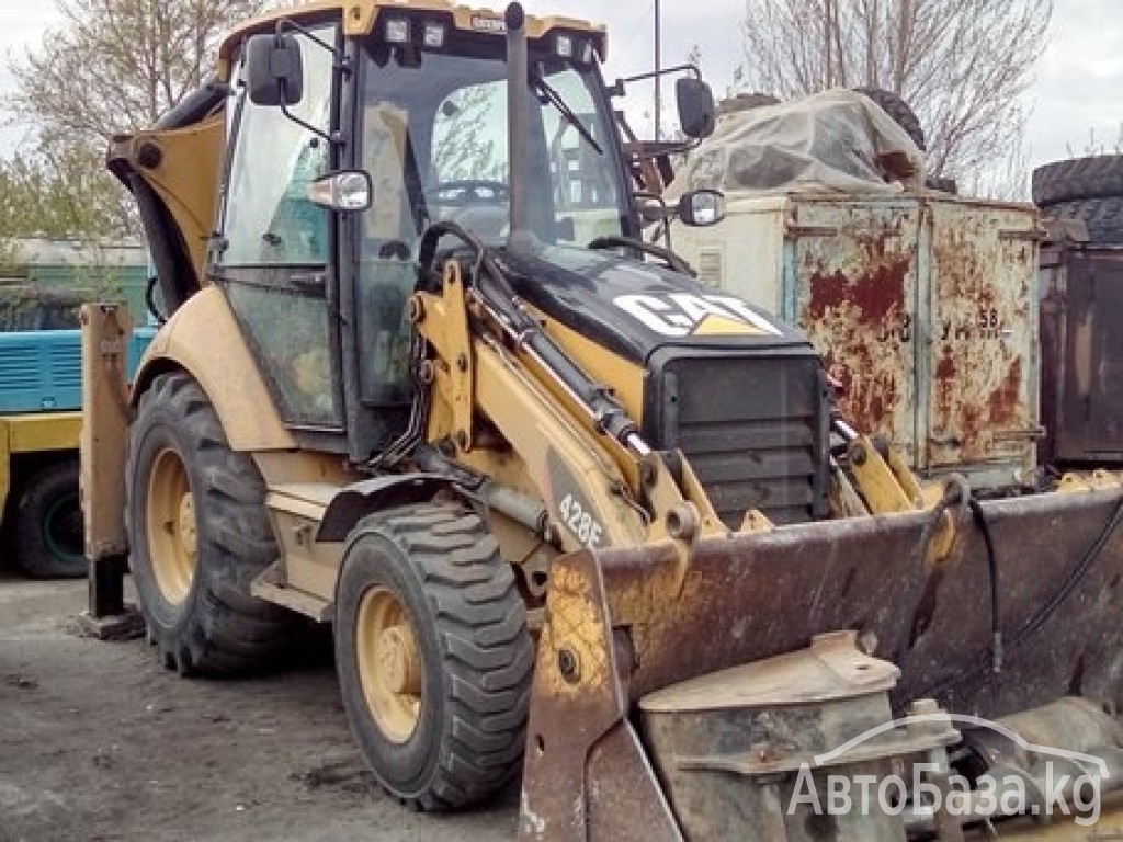 Экскаватор Caterpillar 428E