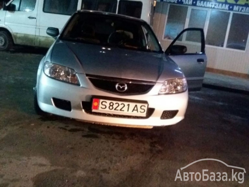 Mazda 323 2002 года за ~218 500 сом