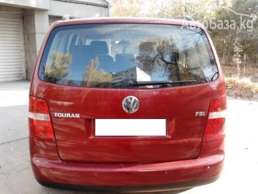 Volkswagen Touran 2004 года за ~609 100 руб.